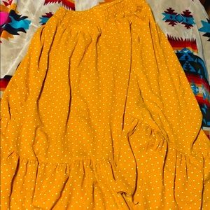 A long flowing yellow dotted skirt:)